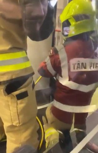 Moment football fan gets stuck in train toilet on way to match forcing fire brigade to be called to come and rescue him