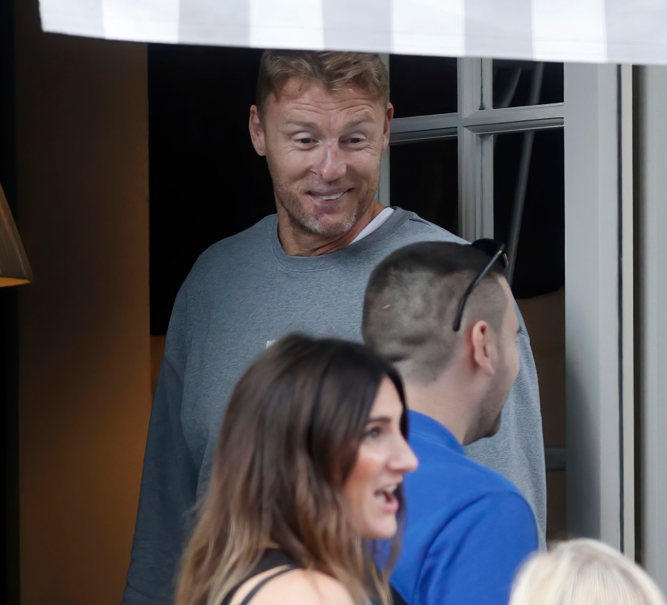 Smiling Freddie Flintoff steps out in London 18 months after brave Top Gear star’s horror crash