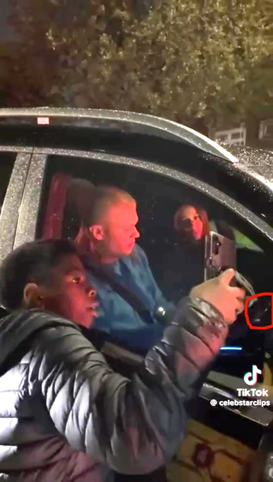 Moment Erling Haaland caught ‘scrolling’ through his phone while driving his £250,000 Mercedes after leaving Etihad