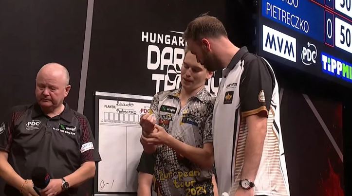 Luke Littler rival dubbed ‘Pikachu’ who squared up to teen quits after just ONE LEG of match at Hungarian Darts Trophy