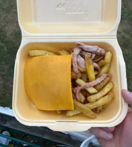 Disgusted fans say ‘this should be arrested’ as football club’s cheesy chips and bacon goes viral