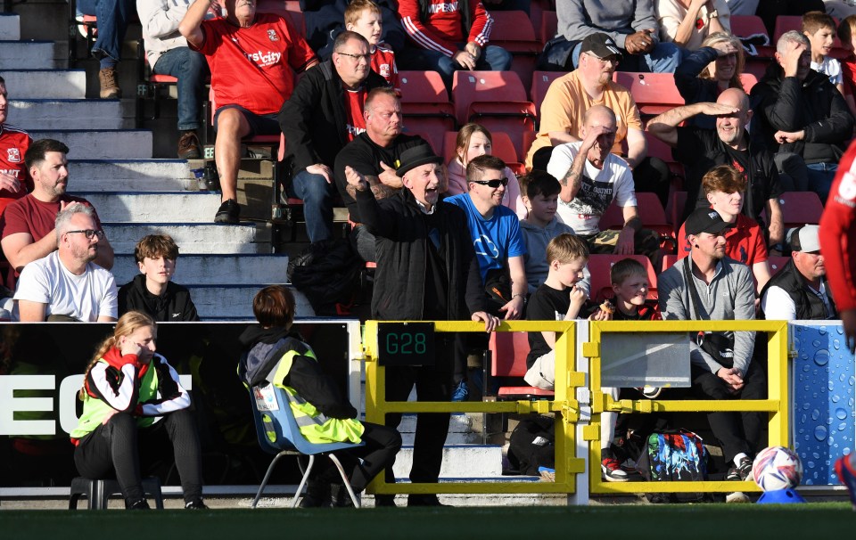 Ian Holloway spotted managing Swindon from the stands despite not starting new job until Monday