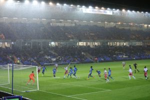 EFL Trophy clash delayed by 38 MINUTES with players forced to undergo second warm up… because of heavy RAIN