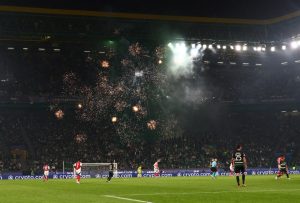 Fireworks explode over Arsenal keeper David Raya’s head during Sporting clash in shocking safety breach