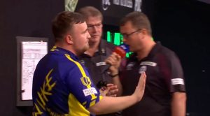 Luke Littler refuses to celebrate after surviving match dart to edge out Mike De Decker 10-9 in Grand Slam of Darts epic