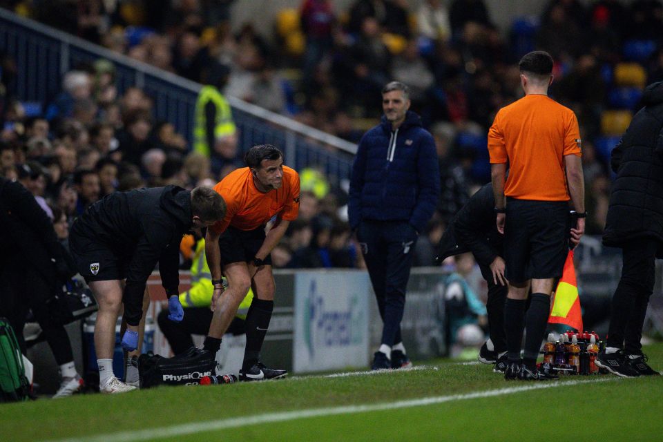 FA Cup clash DELAYED as referee is substituted after injury… with PA appealing for new official over tannoy