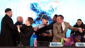 Tommy Fury press conference descends into chaotic brawl as dad John Fury throws water over boxing rival Darren Till