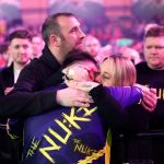 Emotional moment tearful Luke Littler, 17, breaks down in his parents’ arms after cutting interview short at darts