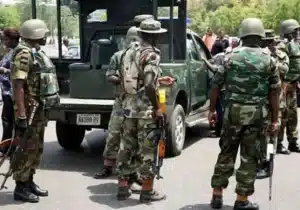 BREAKING: Gun Shots Fired As Soldiers ‘Attack’ Wike’s Men While Trying To Demolish Building In Abuja