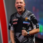 Who is English darts star Chris Dobey?