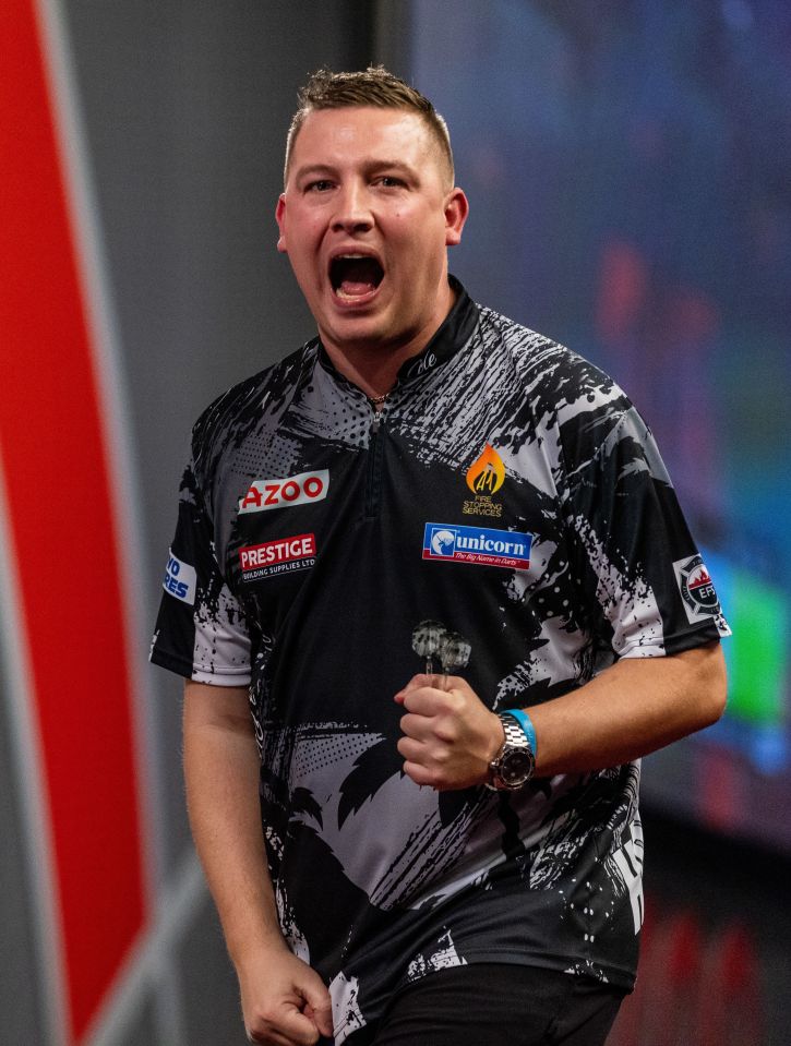 Who is English darts star Chris Dobey?