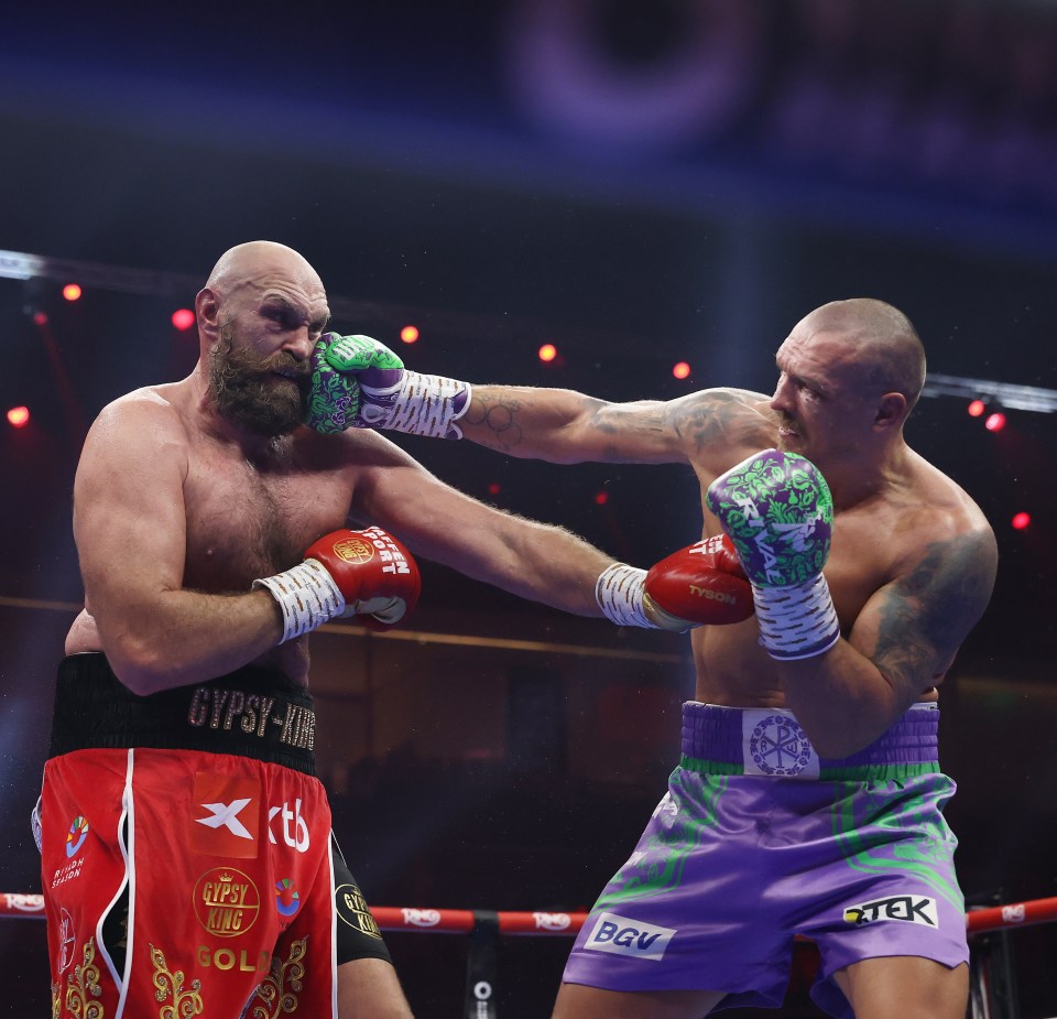 Devastated Tyson Fury consoled by wife Paris as he storms out of ring raging with Oleksandr Usyk defeat