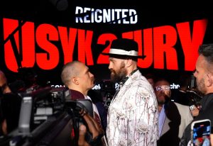 Tyson Fury and Oleksandr Usyk separated by security after neither boxer refused to move for over TEN MINUTES